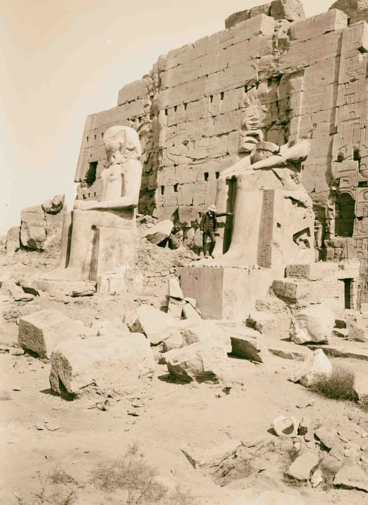 Statues of kings behind 8th pylon, Karnak, Egypt, 1900.