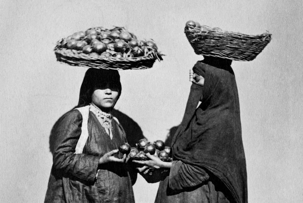 Sellers of oranges.