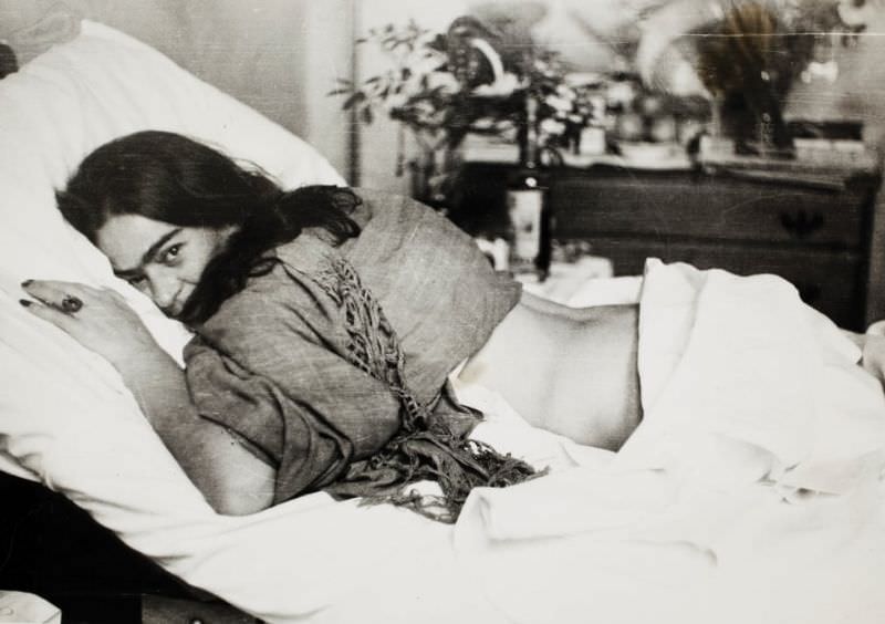 Frida Kahlo lying on her stomach, 1946.