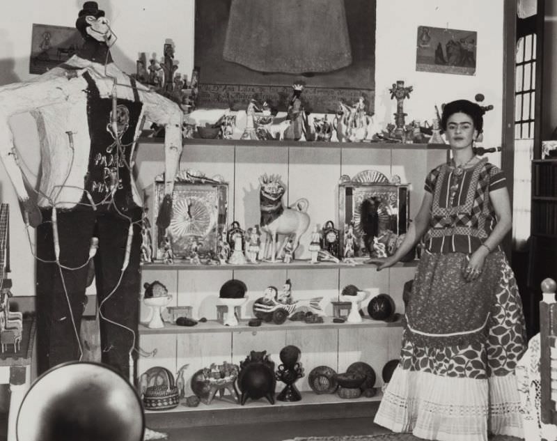 Kahlo in Rivera Living Room with Figure of Judas, 1940.