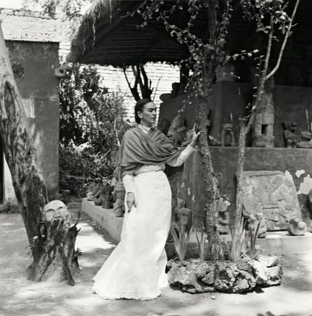 Frida Kahlo in her garden, 1951.