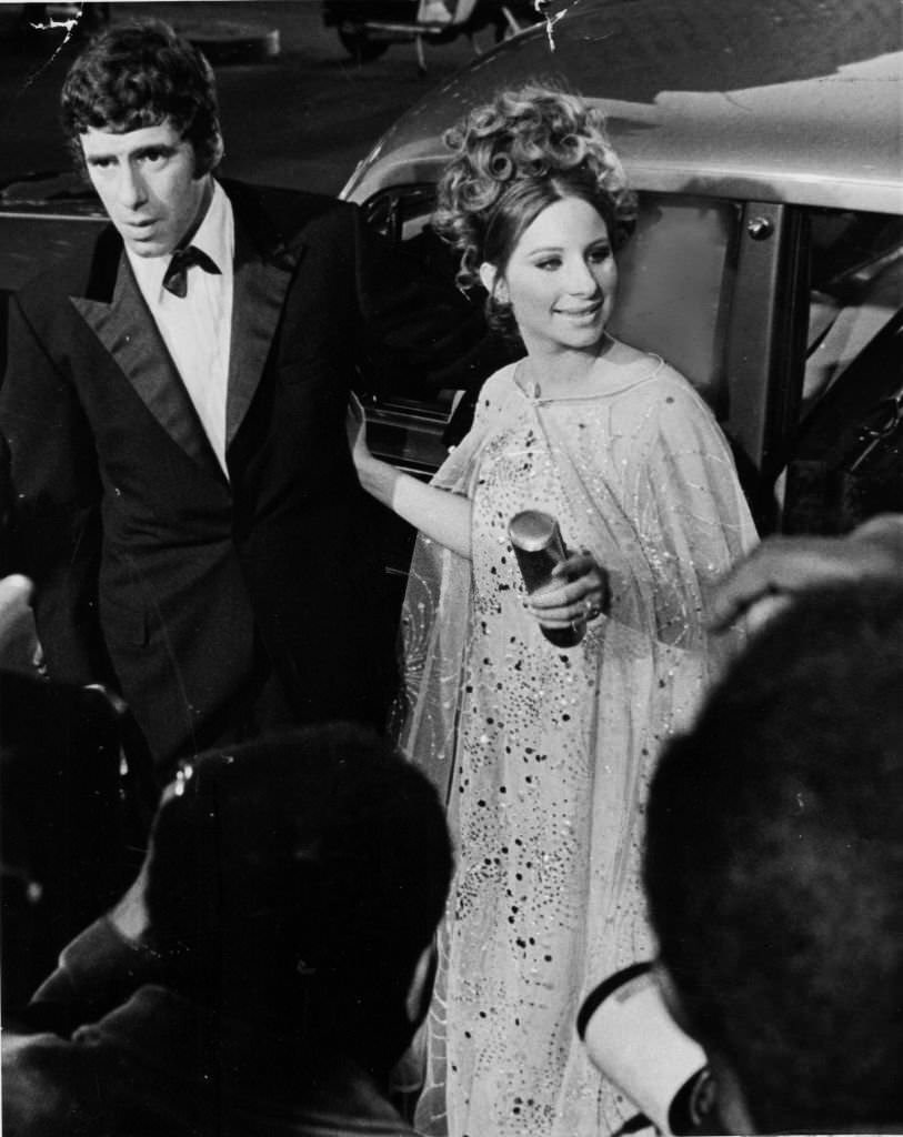 Barbra Streisand and husband actor Elliott Gould arrive at the premiere of her movie Funny Girl at the Criterion Theater on Broadway, 1968.