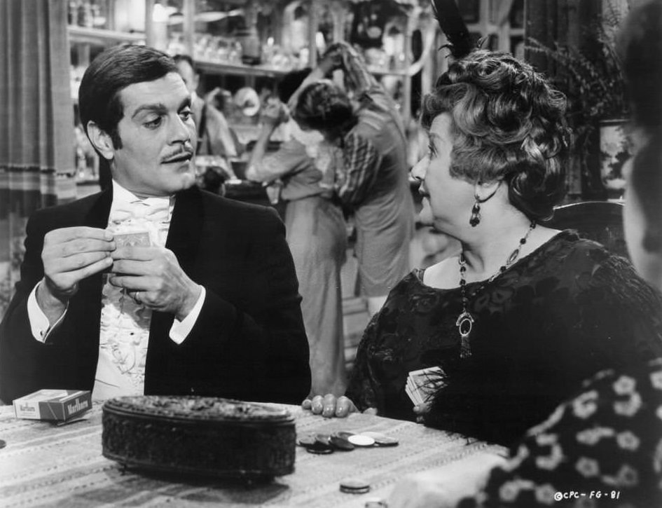 Omar Sharif at card table in a scene from the film 'Funny Girl', 1968.