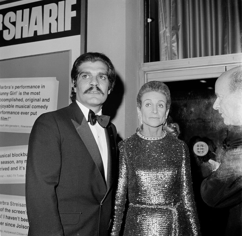 Omar Sharif with Frances Brice-Stark (daughter of Fannie Brice and Nick Arnstein) attends the premiere of 'Funny Girl', 1968.