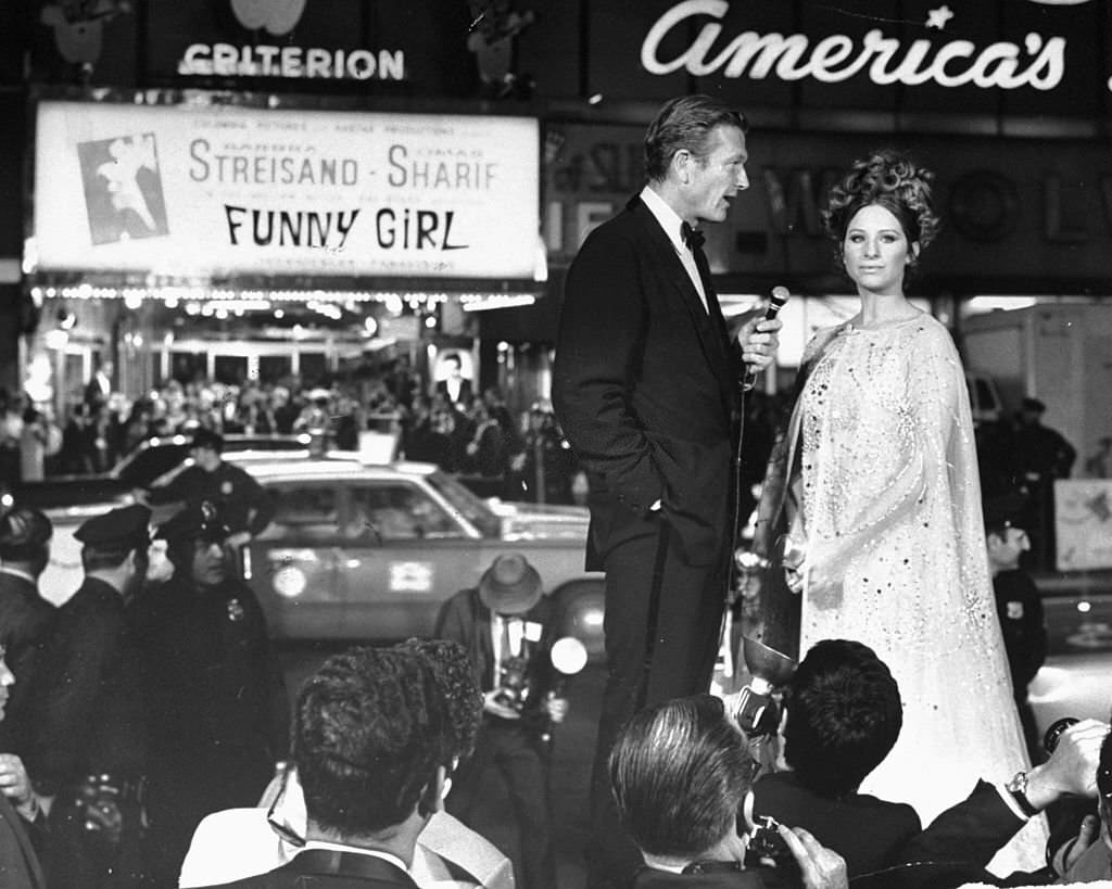 Barbra Streisand is interviewed by New York Mayor John V. Lindsay at the premiere of the movie "Funny Girl."