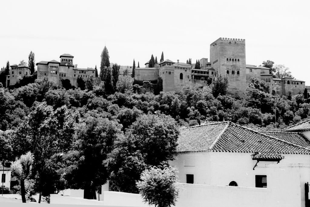 A view of the Alhambra is the city, fortress and palace erected by the monarchs of the Nasrid dynasty of the Kingdom of Granada.