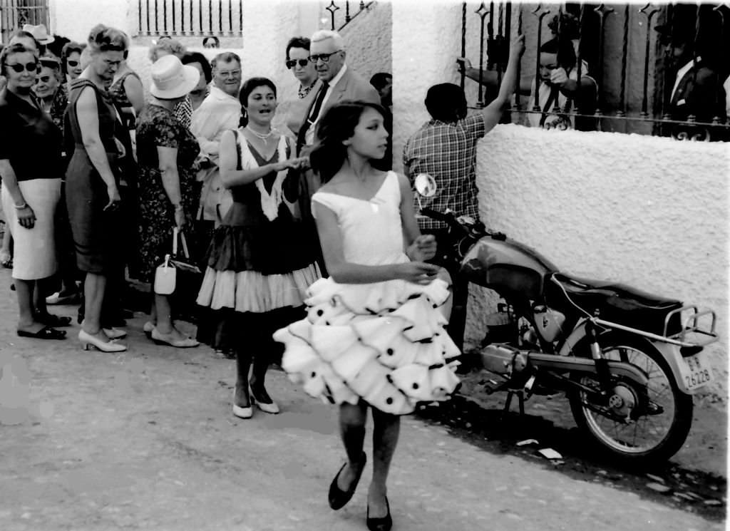 Girl dancing flamenco in the gypsy neighborhood of Sacromonte, Granada, Spain, 1966.