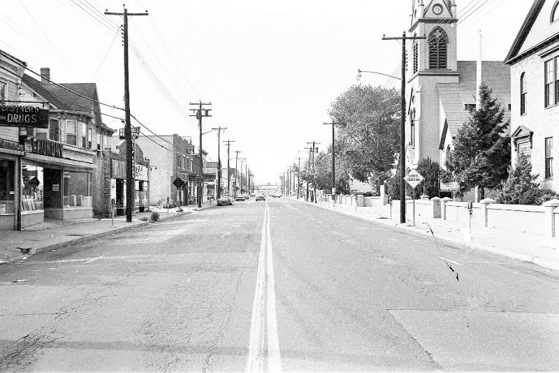 Looking north on Broadway. Scheiner's Drug store to the left, Hicksville, New York, 1967