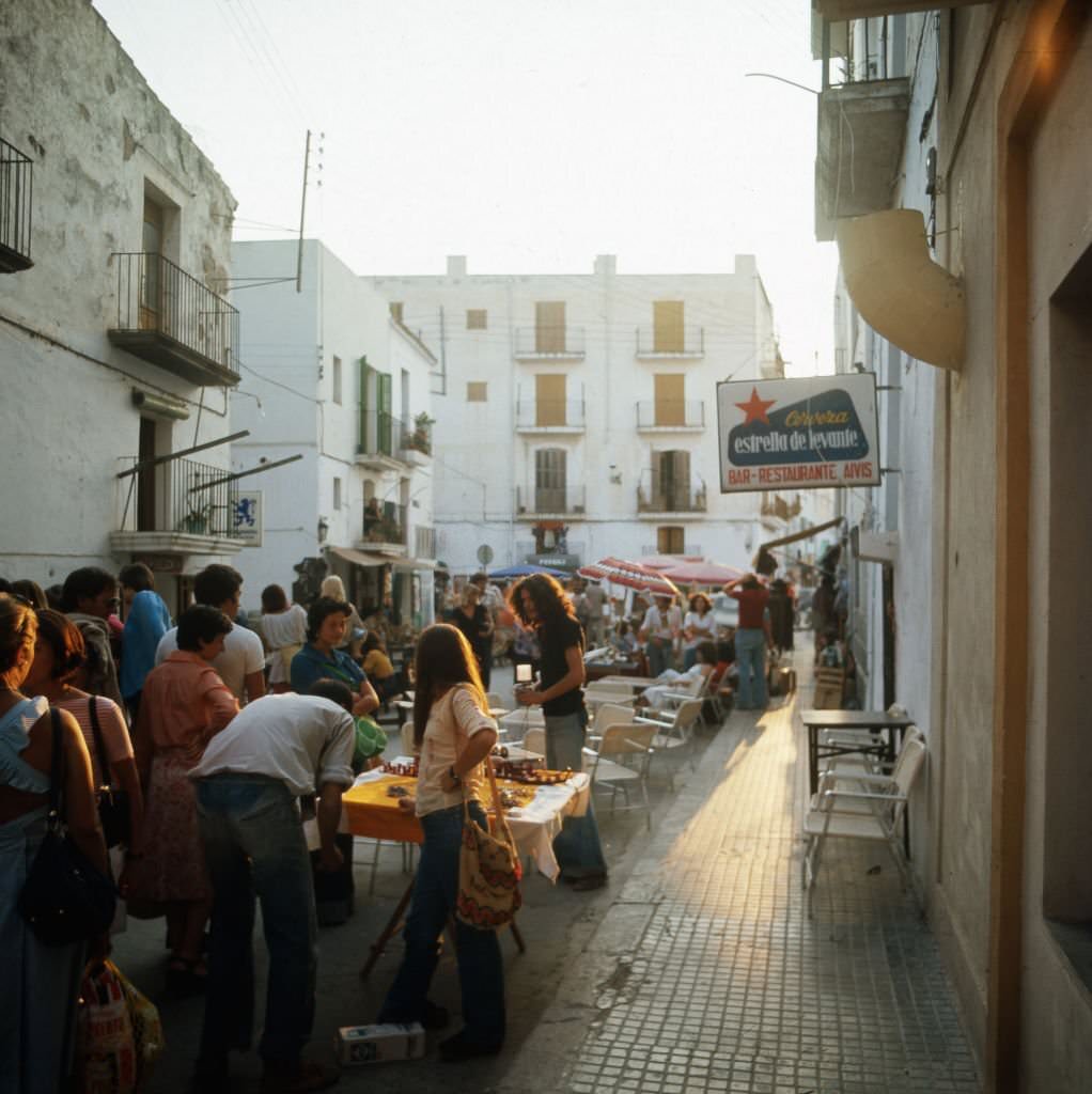 Shopping at a hippie market in the city of Ibiza, 1976