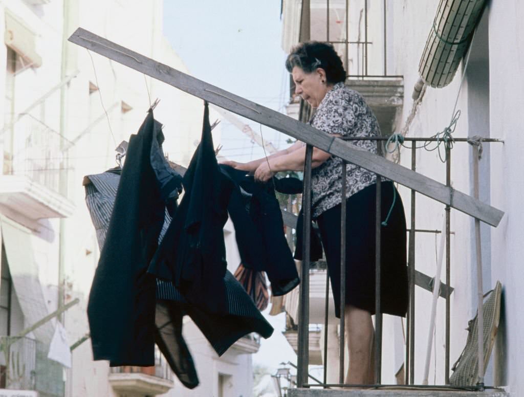 Woman tending clothes in Ibiza, 1976