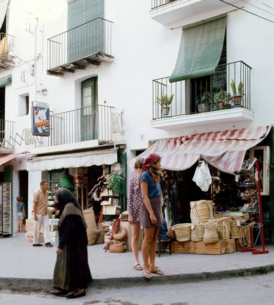 Tourists through the streets of Ibiza, Balearic Islands, Spain, 1975.