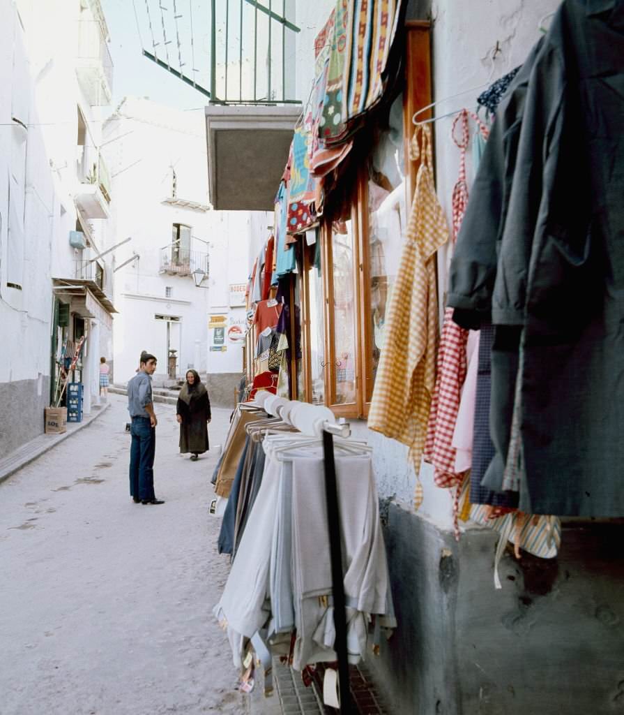 Tourists through the streets of Ibiza, Balearic Islands, Spain, 1975