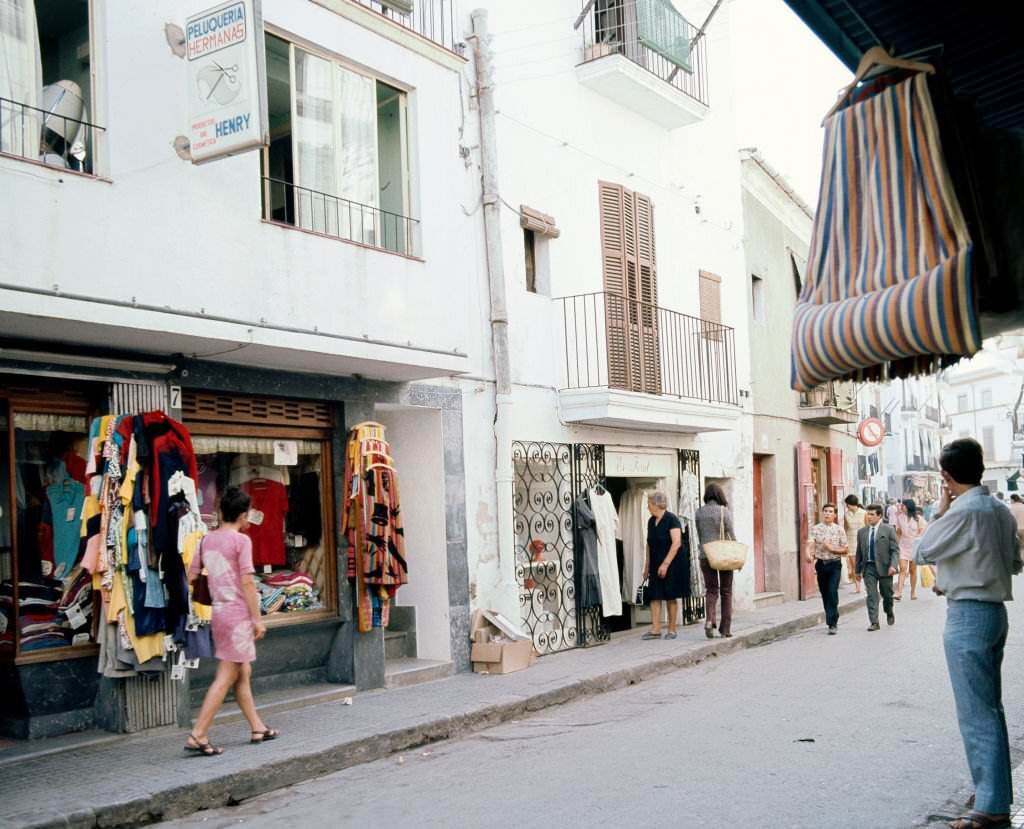 Tourists through the streets of Ibiza, Balearic Islands, Spain, 1975