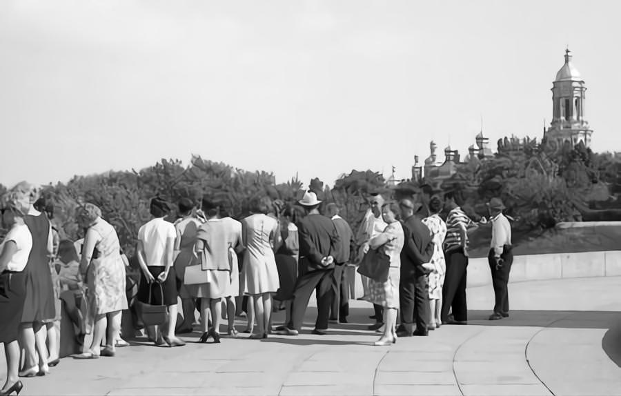 Tourists on a square and the Saint Sophia"s Cathedral in Kyiv.