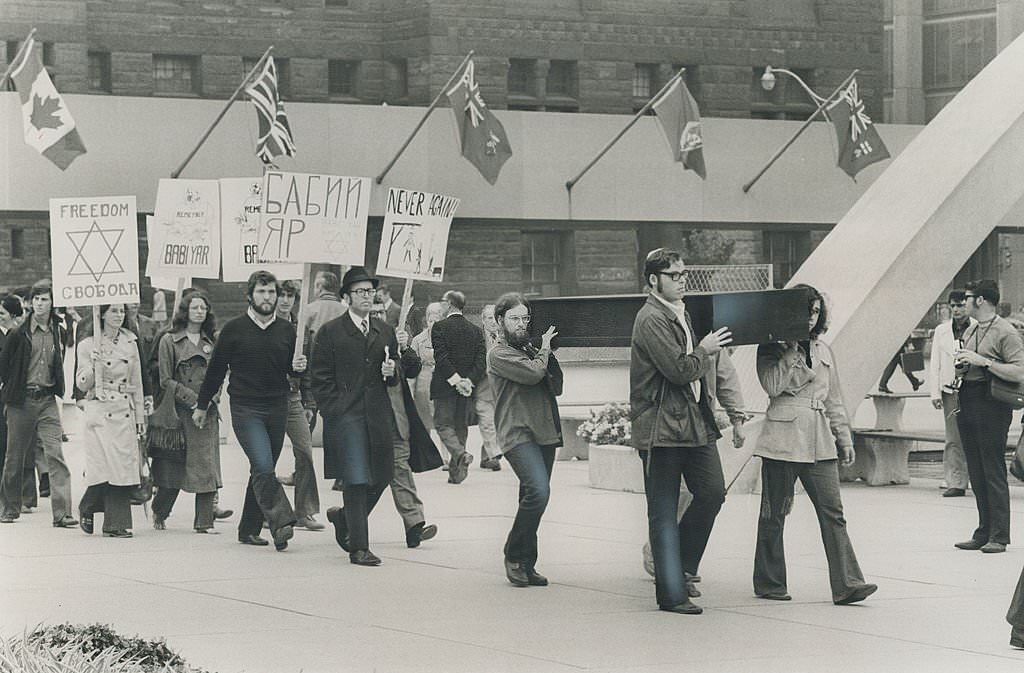 Students Mark Anniversary of Massacre; Marchers parade through Nathan Phillips Square today to comme.