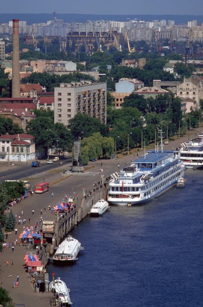 Boats and barges line the Dnieper River in Kyiv.