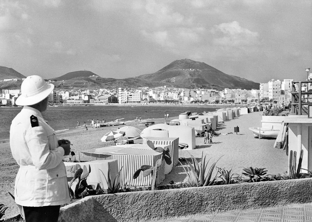 Police on the beach, 1950s