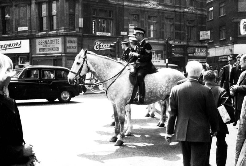 Mounted police, presumably City of London, at Ludgate Circus, summer 1973