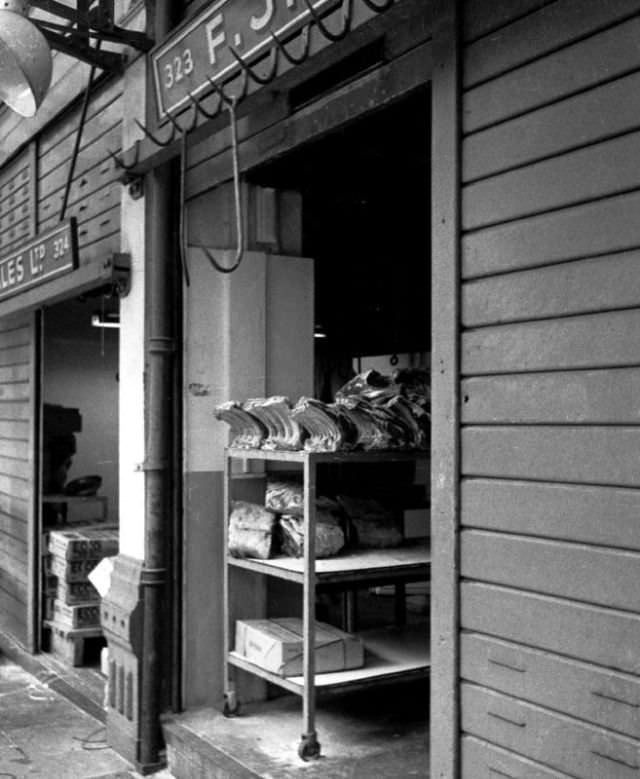 Racks of rib roasts at the Smithfield meat market, London, March 1973