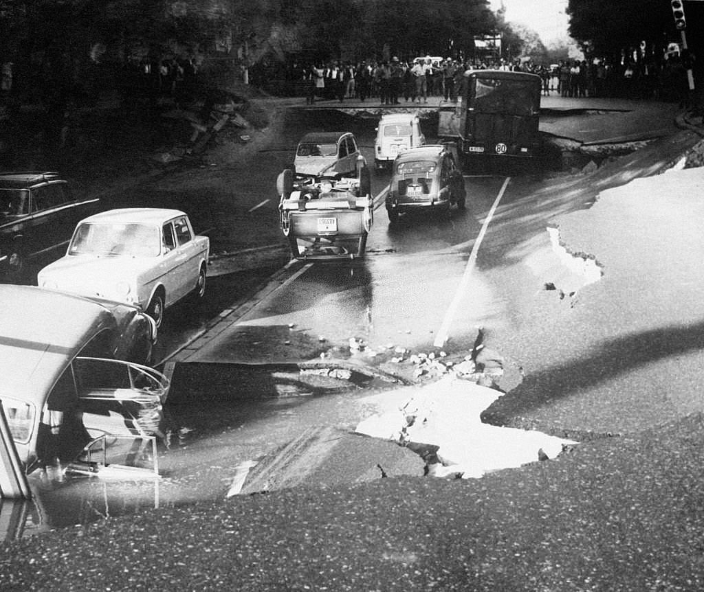 Pavement collapse with cars at the bottom of the escavation, in Madrid, Spain on October 9, 1967.