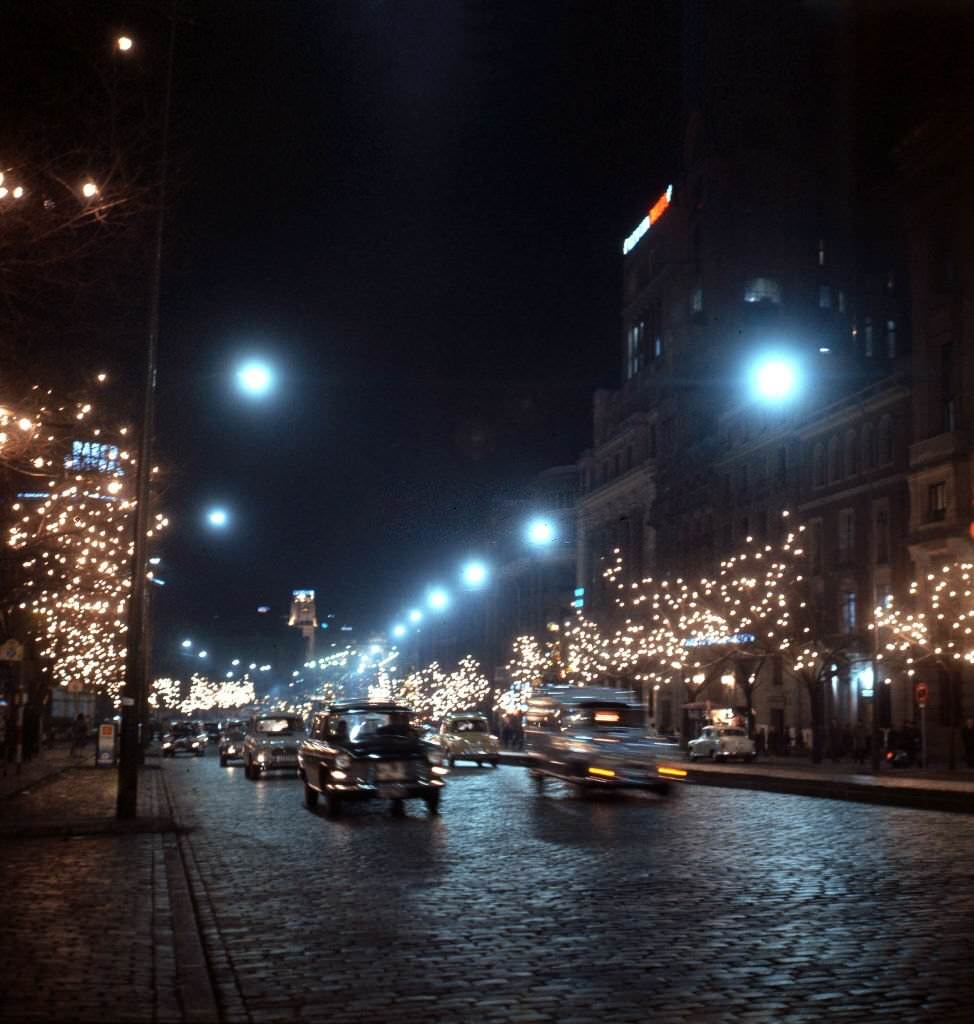 A Madrid street decorated with Christmas lights, in Madrid, Spain, late 1960s.