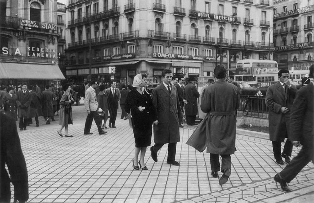 Couple in love walking in the streets of Madrid, 1960