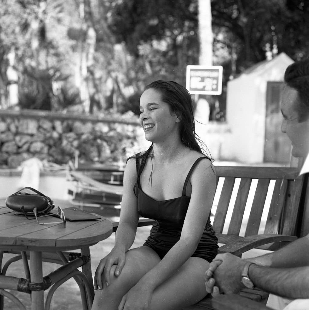 Oona O'Neill, wife of Charles Chaplin during a family holiday in Mallorca, 1959
