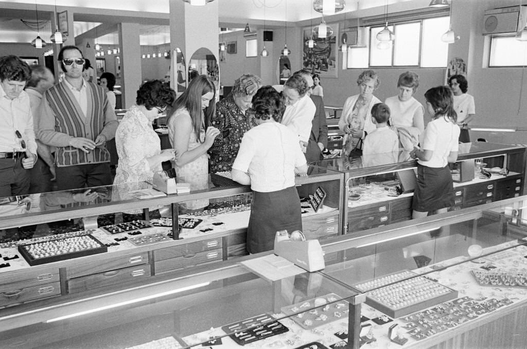Looking for bargains, souvenir shopping, Majorca, Spain, August 1971.