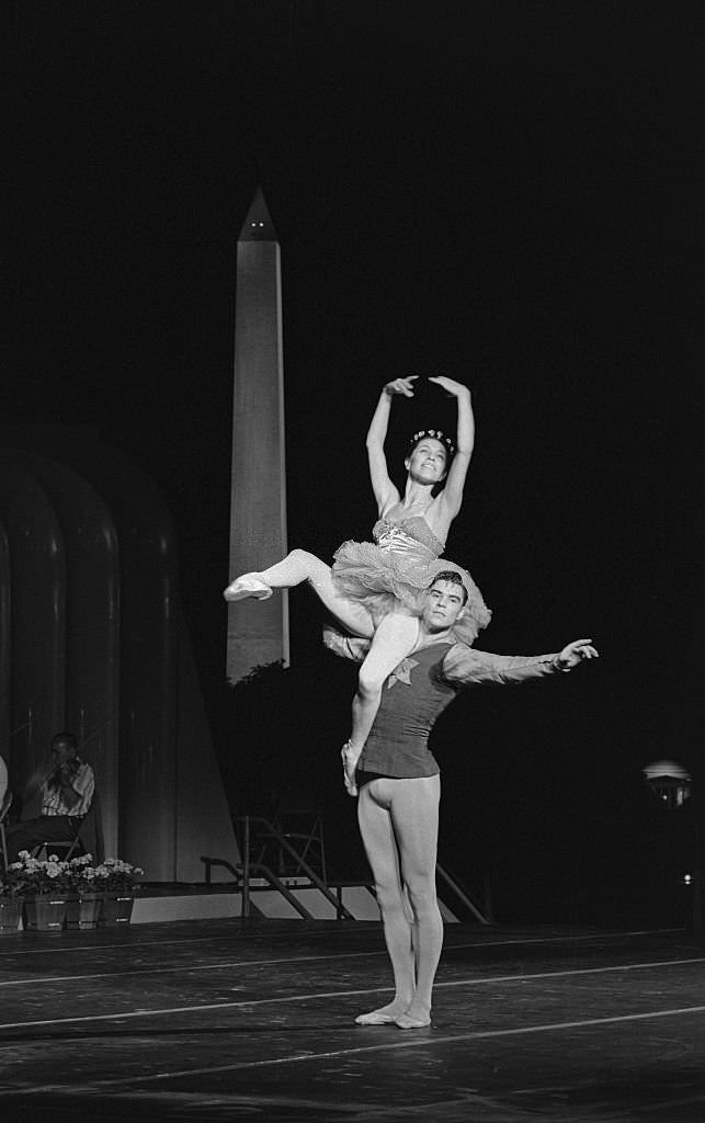 Maria Tallchief and Jacques d'Amboise performing on the South Lawn of the White House tonight during a rehearsal for a program to follow the State Dinner for German Chancellor Ludwig Erhard tomorrow night.