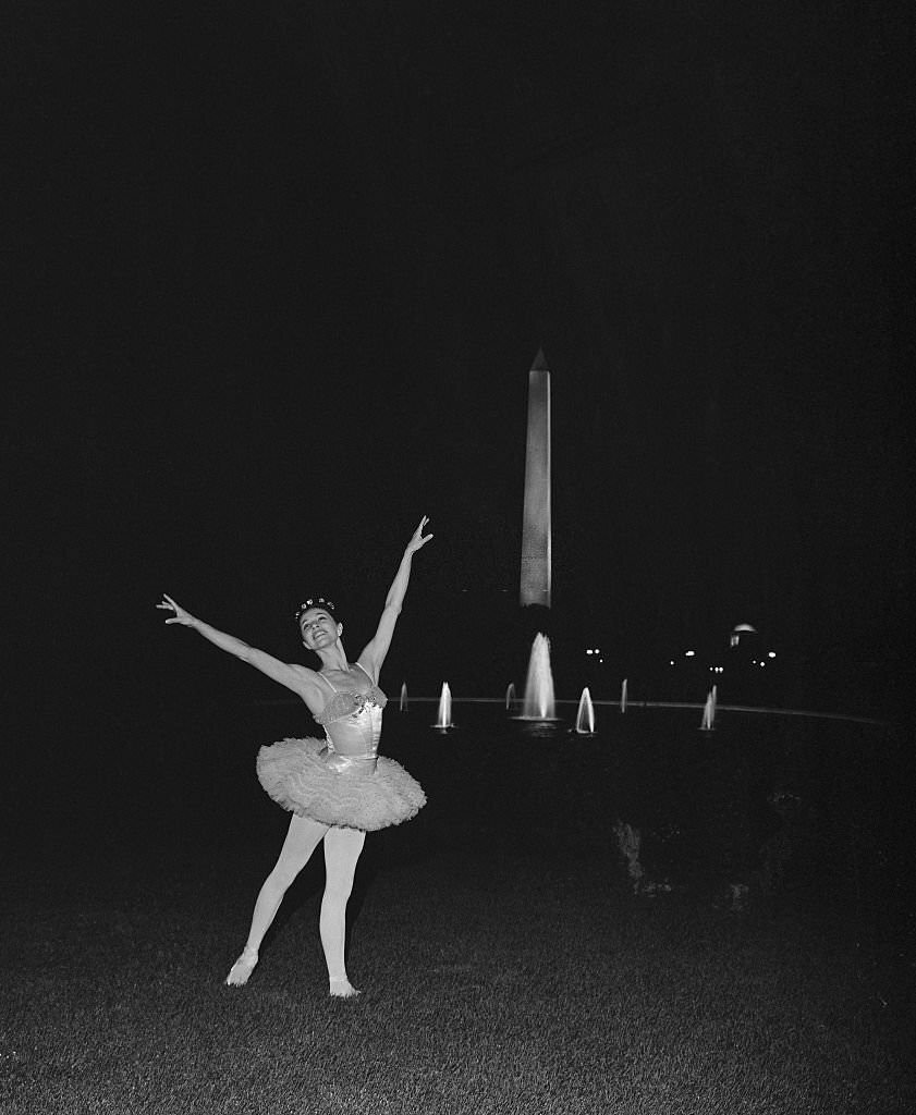 Maria Tallchief performing on the South Lawn of the White House tonight during a rehearsal for a program to follow the State Dinner for German Chancellor Ludwig Erhard tomorrow night.