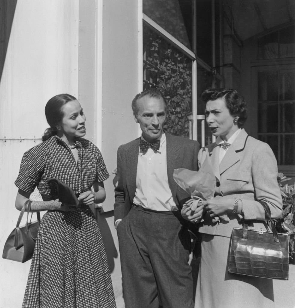 Maria Tallchief and Nora Kaye with American ballet choreographer George Balanchine in Paris, 1950