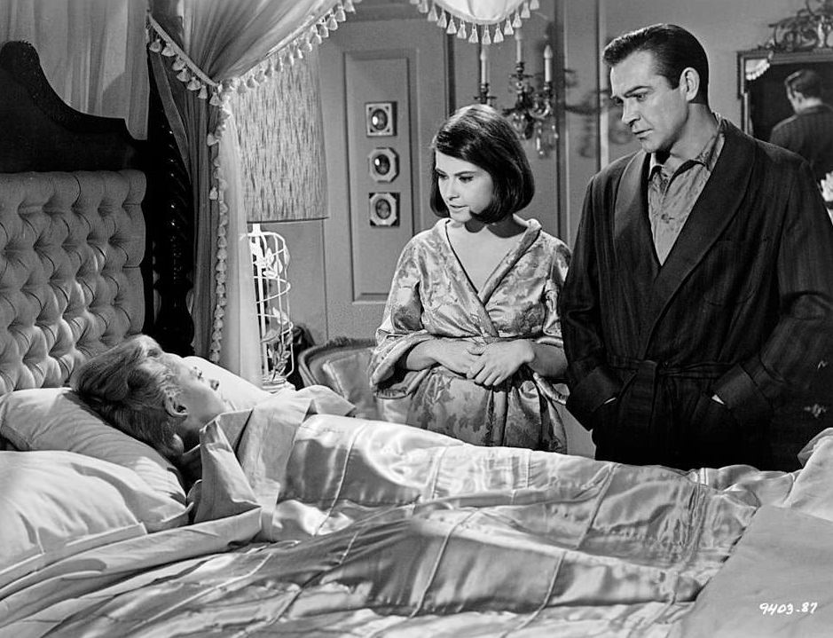 Sean Connery introduces his bride to be Tippi Hedren to his father Alan Napier and his sister-in-law Diane Baker in 'Marnie', 1964.