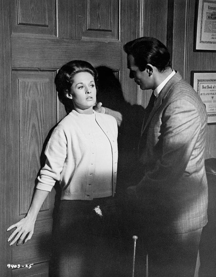 Tippi Hedren is caught by Sean Connery while trying to rifle his safe in a scene from the film 'Marnie', 1964.