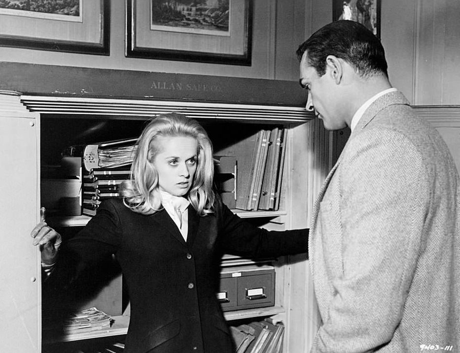 Tippi Hedren is caught by Sean Connery while trying to rifle his safe in a scene from the film 'Marnie', 1964.