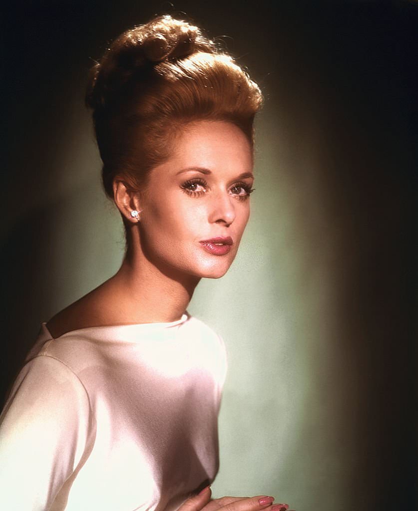 Tippi Hedren headshoulders of Hedren wearing white top, 1964