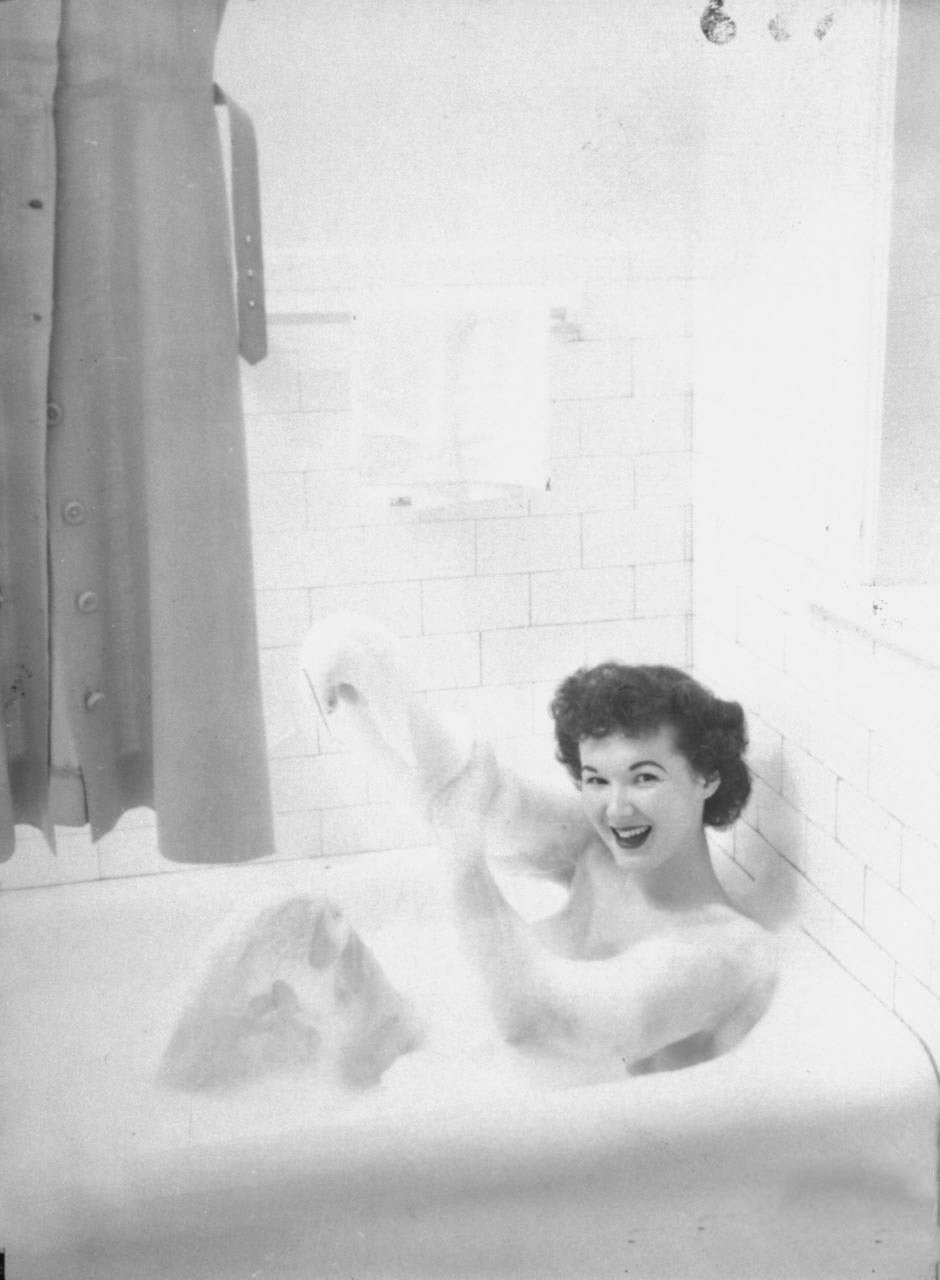 Student at the McConnell Air Hostess School taking a bath.