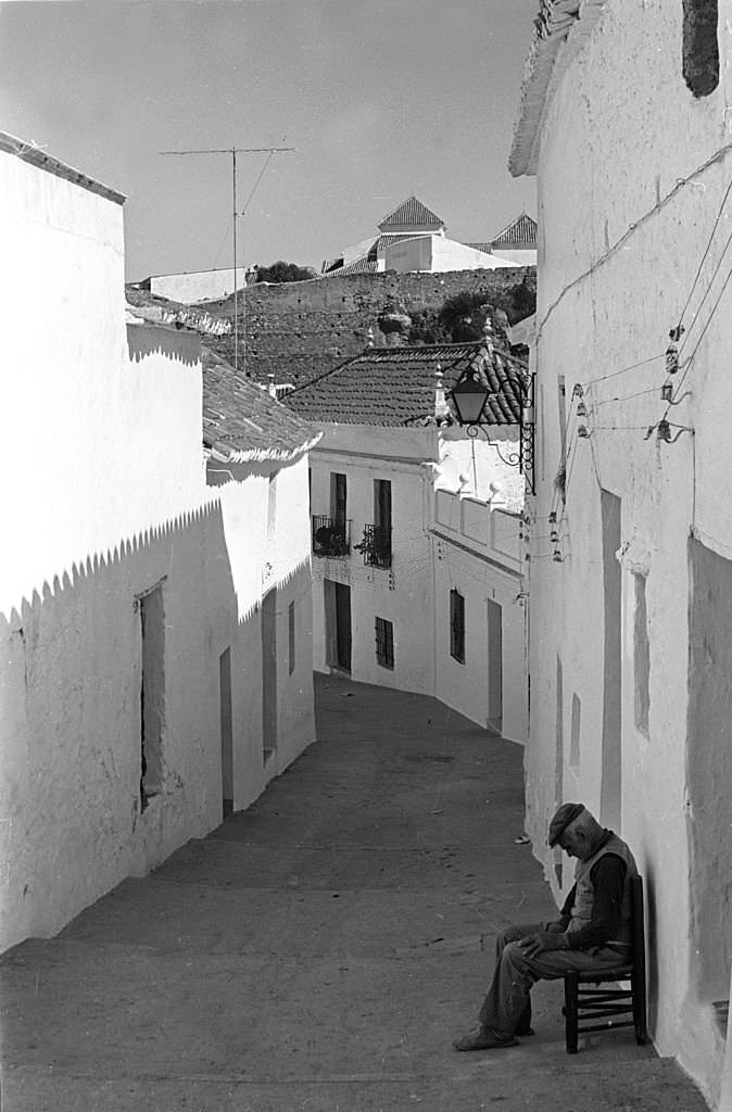 Elder resting in a tipical street, Mijas, 1974