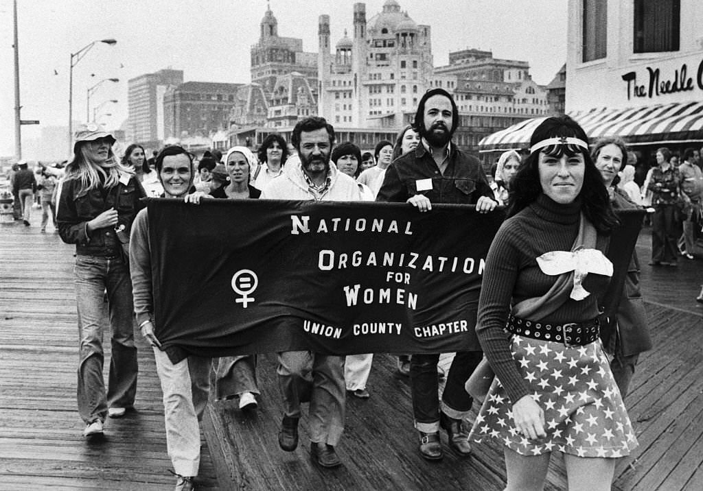 Members of the National Organization of Women (NOW) parade down the boardwalk in Atlantic City, New Jersey.