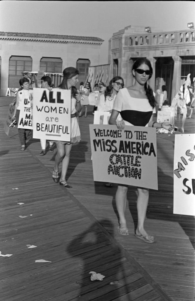 On the Atlantic City Boardwalk, demonstrators with posters, protesting against the Miss America beauty pageant, Atlantic City, 1968.