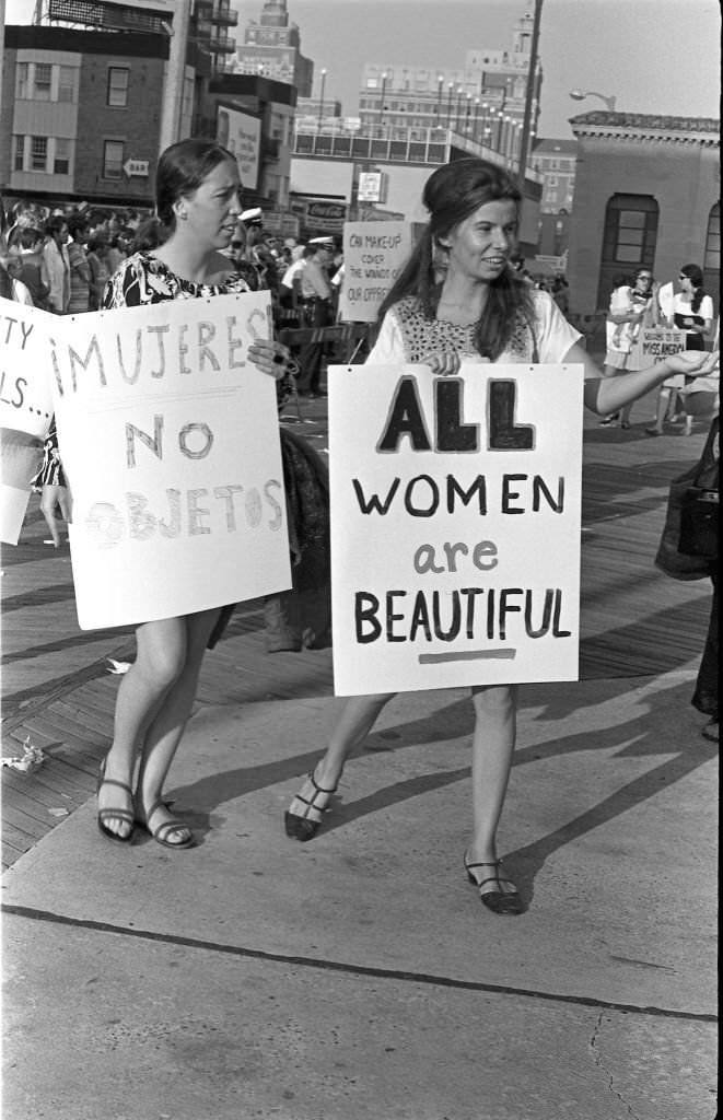 Demonstrators carry posters as they protest the Miss America beauty pageant, Atlantic City, 1968.