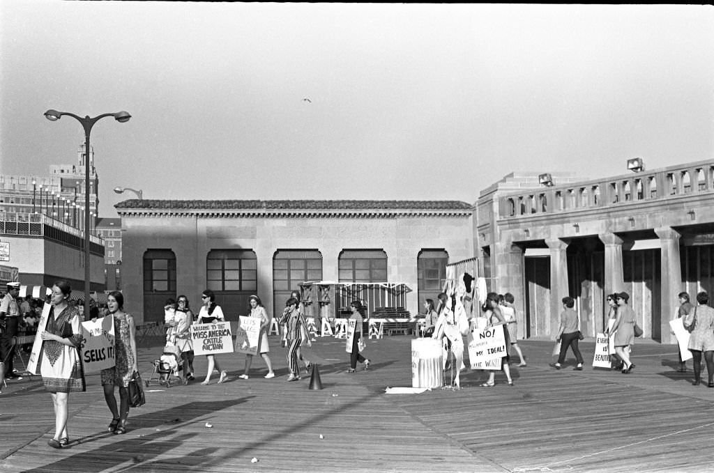 Demonstrators with posters, protest the Miss America beauty pageant, Atlantic City, New Jersey, September 7, 1968.