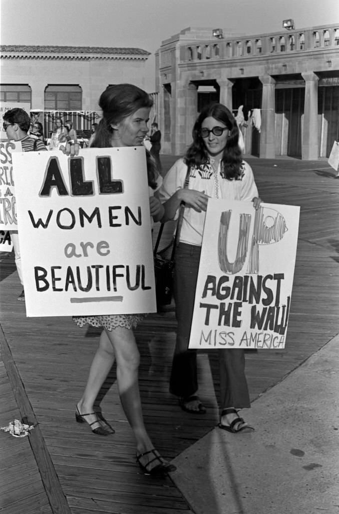 Demonstrators carry posters as they protest the Miss America beauty pageant, Atlantic City, 1968.