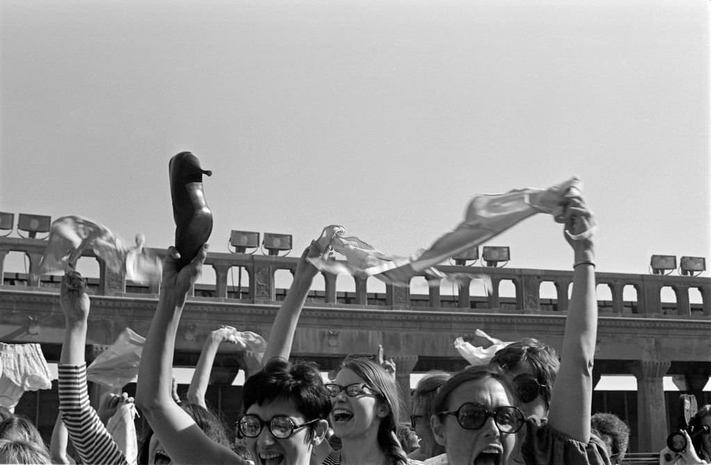 On the Atlantic City Boardwalk, demonstrators, some waving high heels or underwear, protest the Miss America beauty pageant, Atlantic City, New Jersey, September 7, 1968.
