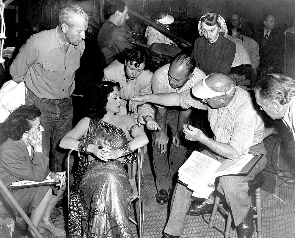 Hedy Lamarr with director Cecile B.DeMille on the set of his movie 'Samson and Delilah'.