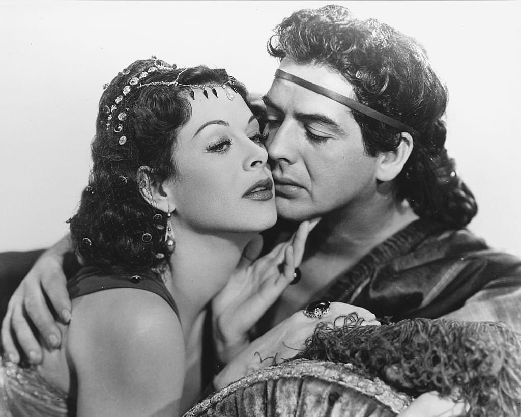 Hedy Lamarr and Victor Mature both in costume in a publicity portrait issued for the film, 'Samson and Delilah', 1949.