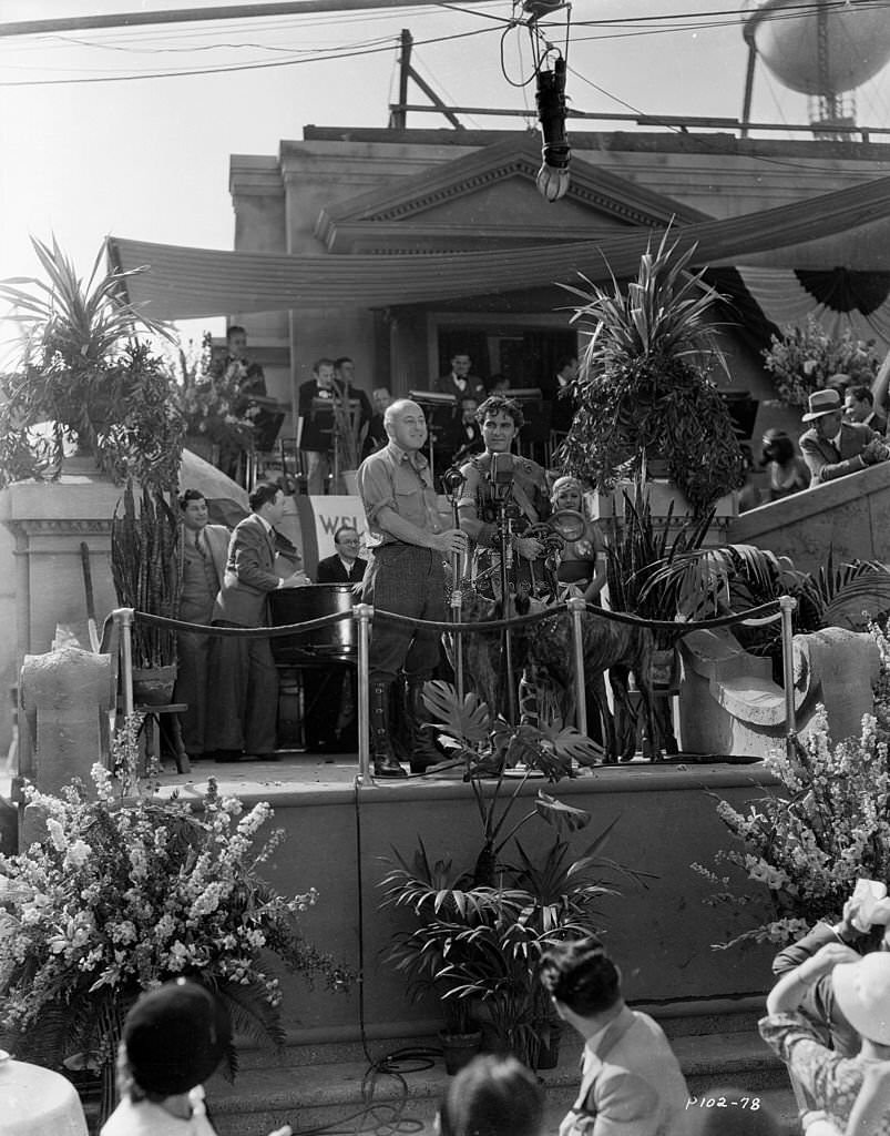 Cecil B. DeMille and founder of Paramount Films, on the set of 'Samson And Delilah' with Henry Wilcoxon who plays Prince Ahtur, 1949.