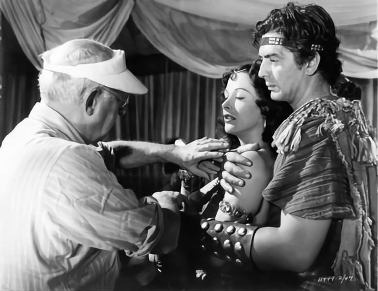 Cecil B DeMille on set candid directing Hedy Lamarr and Victor Mature in 'Samson and Delilah', 1949