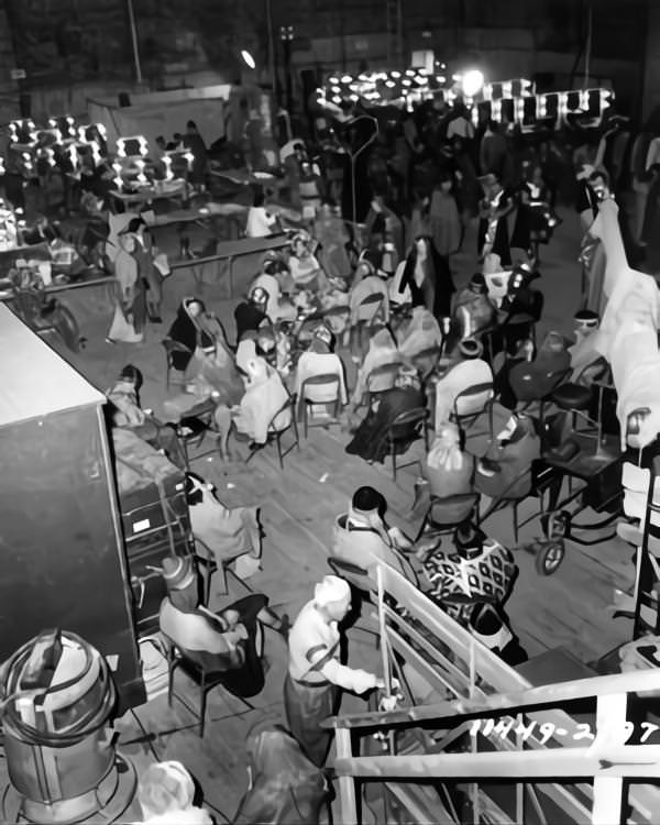 Extras being made up on sound stage on set candid during filming of 'Samson and Delilah', 1949