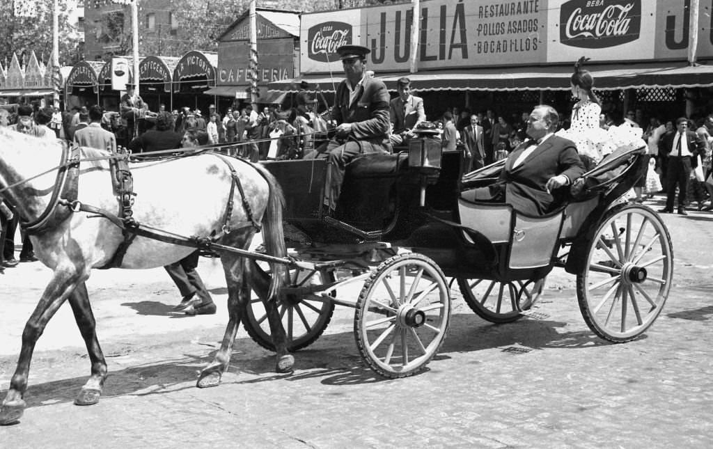 American actor and director Orson Welles in the "Feria de Sevilla" with his daughter Beatrice, Sevilla, Spain, 1966.