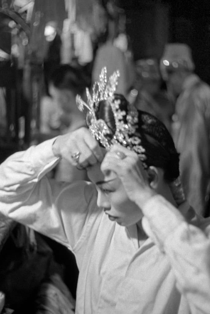 Asian girl wearing a little crown in Singapore, 1962